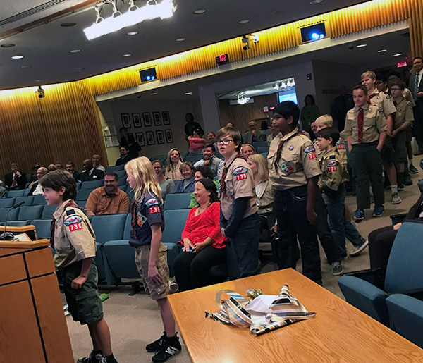 boy scouts line up to speak at the Board of Supervisors meeting